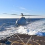 На палубу эсминца впервые посадили полноразмерный вертолет-беспилотник