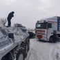 В Киеве из-за снегопада задействовали БТР