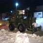 В Киеве расчищают снег с помощью военной техники