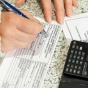 Долг украинцев в апреле за жилкомуслуги сократился почти на 8%